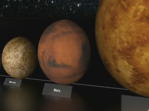 Dünya, yanında kum tanesi kadar