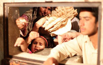 İHH'dan Suriye'ye günde 20 bin ekmek