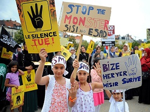 Belçika'da binlerce kişi katliamları protesto etti