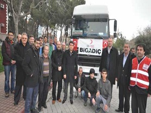 Bigadiç'ten Suriyeli sığınmacılara gıda ve giyecek yardımı