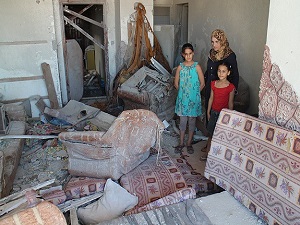 Gazze'de harabeye dönmüş evlerde tedirgin bekleyiş