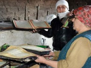 Küle dönen evde sadece Kur'an-ı Kerimler yanmadı