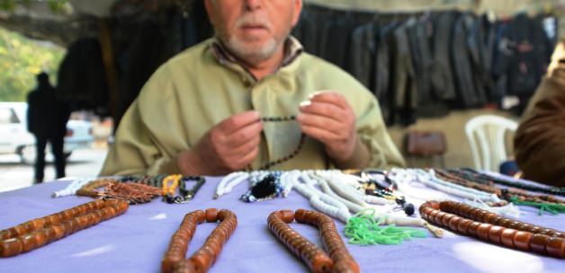 Bu handa 'tespih şıkırtısı' eksik olmuyor