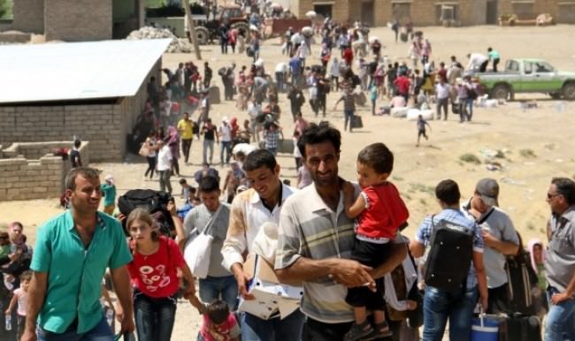 Suriyelilerden kefenli eylem