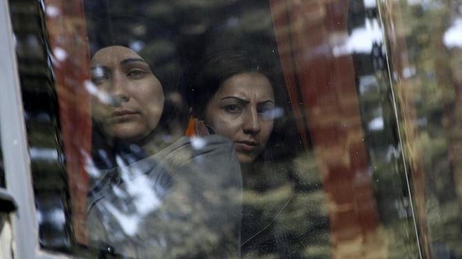 Trudeau Kanada'ya ulaşan ilk Suriyeli mülteci kafilesini karşıladı