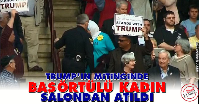 Trump'ın mitinginde başörtülü kadın salondan atıldı