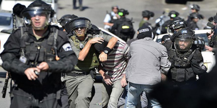 İsrail askerleri 17 Filistinliyi evlerinde gözaltına aldı