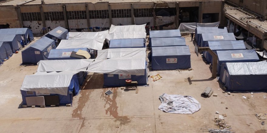 Suriye'nin Humus şehrindeki sığınmacıların yardım çığlığı