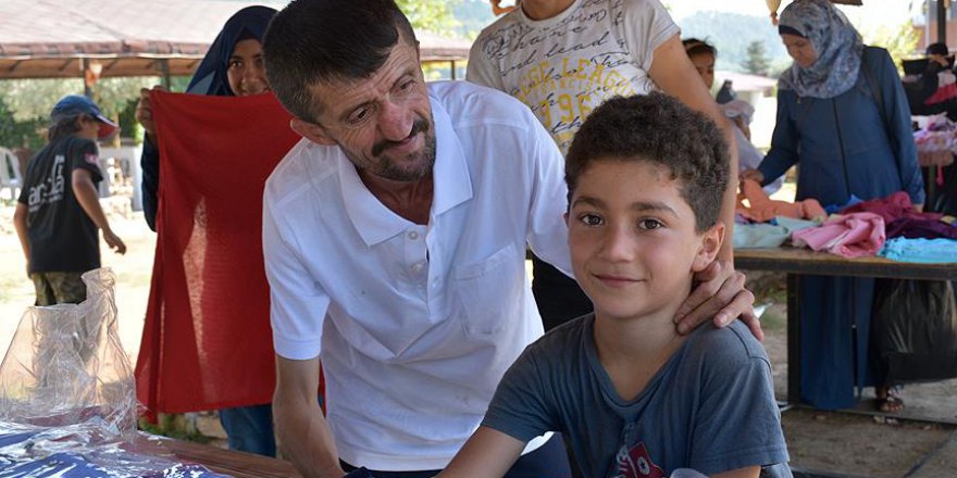 'Simitçi Erkan' Suriyeli yetimleri sevindirdi
