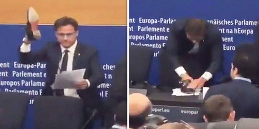 İtalyan üyeden ilginç protesto: Ayakkabı ile ezdi