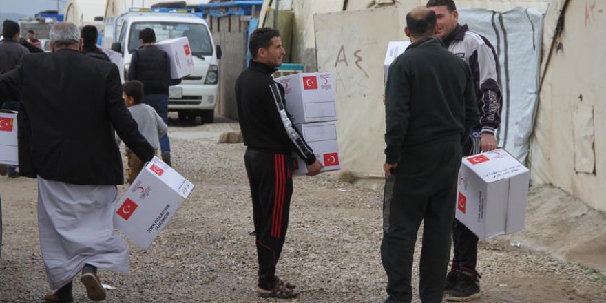 Türk Kızılayı'ndan Telaferli iç göçmenlere kışlık giysi yardımı