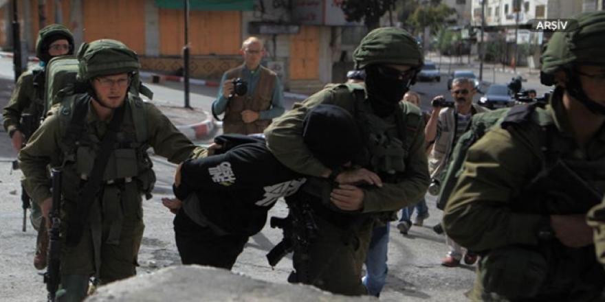 İsrail işgal güçleri 20 Filistinliyi gözaltına aldı