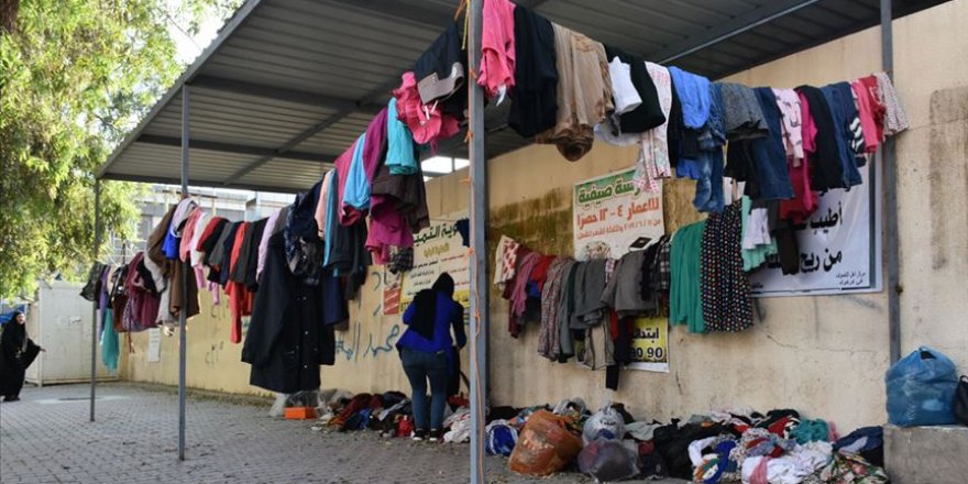 Kerküklü ihtiyaç sahipleri 'Merhamet Duvarı' ile gülüyor