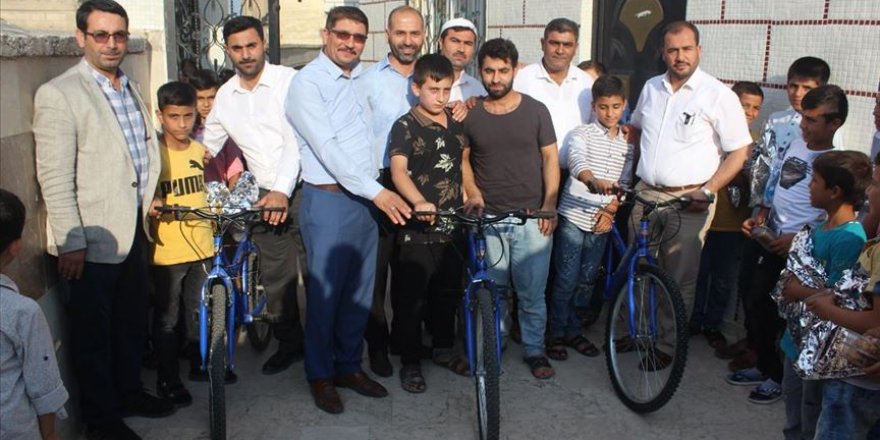 Kur'an-ı Kerim'i güzel okuyan çocuklara bisiklet