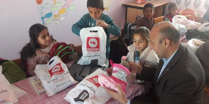 Türk Kızılayın giyecek yardımları çocukları ısıtacak