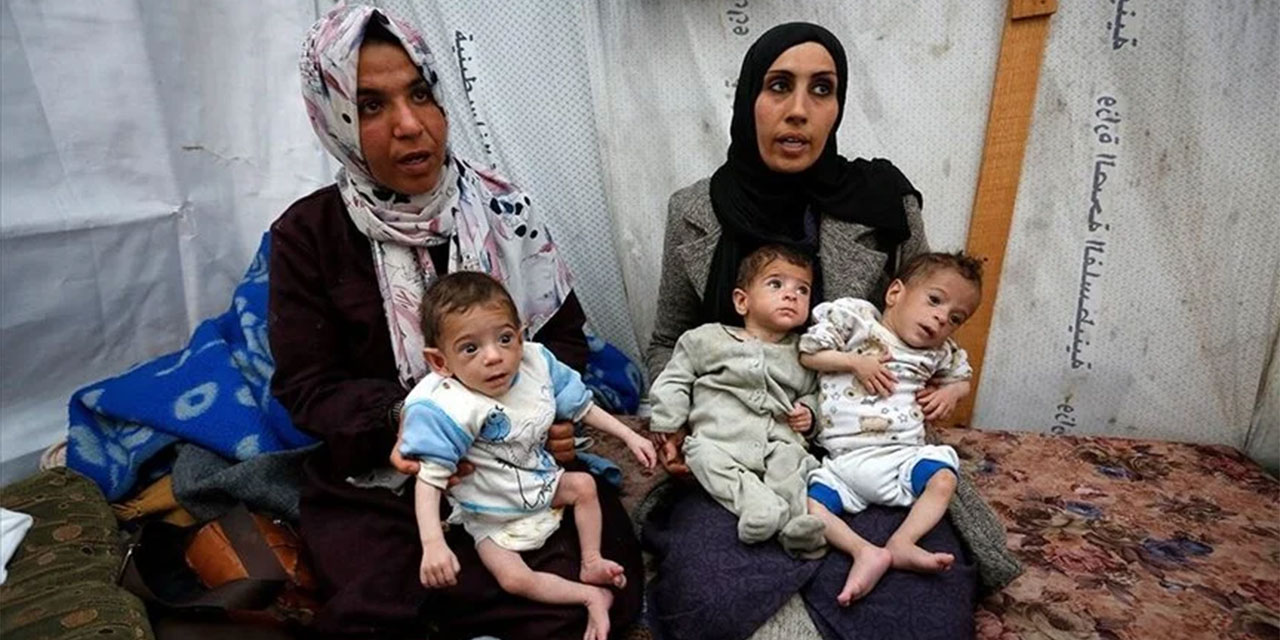 Filistinli anne açlıkla boğuşan üçüzlerinin hayatından endişe ediyor