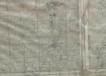 Kur'an-ı Kerim'i bir tabaka kağıda yazmışlar